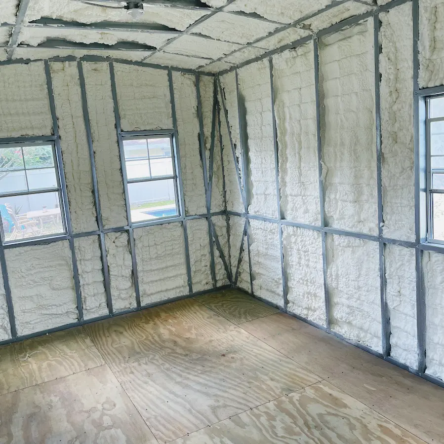 Closed-cell spray foam insulation applied to wall cavities in a residential project in West Livingston
